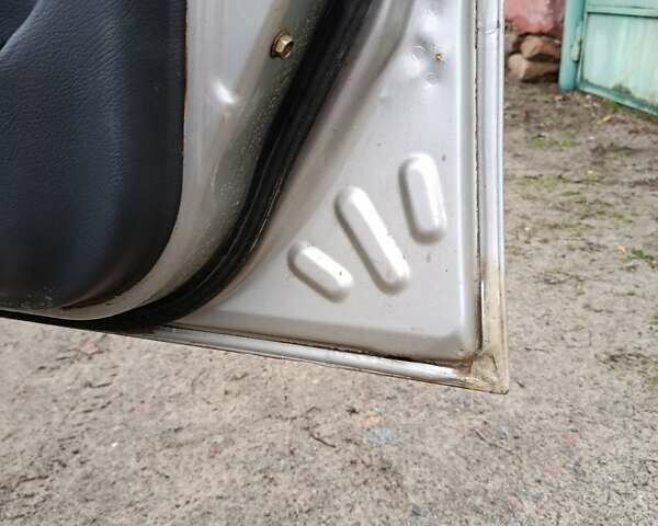 Сірий Деу Ланос, об'ємом двигуна 1.5 л та пробігом 257 тис. км за 1999 $, фото 2 на Automoto.ua