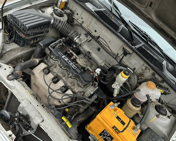 Сірий Деу Ланос, об'ємом двигуна 1.5 л та пробігом 200 тис. км за 1350 $, фото 5 на Automoto.ua