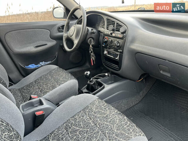 Сірий Деу Ланос, об'ємом двигуна 1.5 л та пробігом 110 тис. км за 1650 $, фото 26 на Automoto.ua