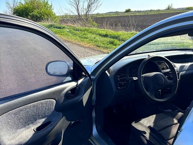 Серый Дэу Ланос, объемом двигателя 1.5 л и пробегом 225 тыс. км за 1600 $, фото 8 на Automoto.ua