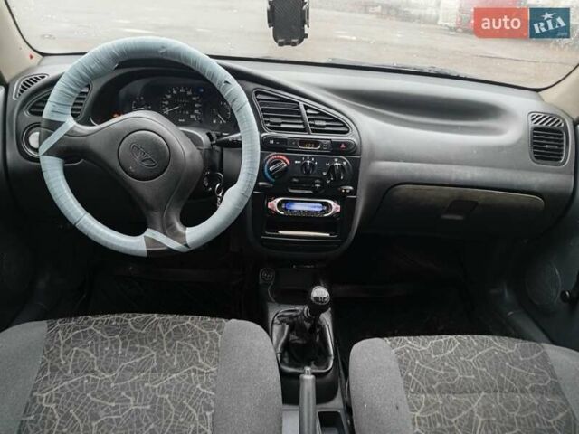 Сірий Деу Ланос, об'ємом двигуна 1.5 л та пробігом 172 тис. км за 1250 $, фото 9 на Automoto.ua