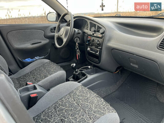 Сірий Деу Ланос, об'ємом двигуна 1.5 л та пробігом 110 тис. км за 1650 $, фото 29 на Automoto.ua