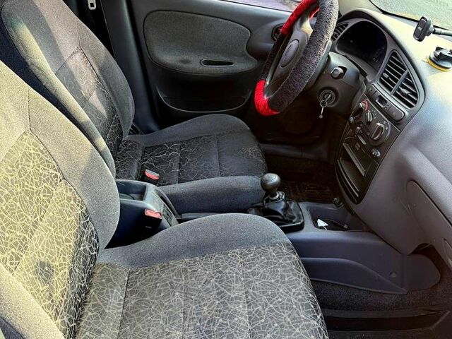 Серый Дэу Ланос, объемом двигателя 1.5 л и пробегом 300 тыс. км за 999 $, фото 7 на Automoto.ua