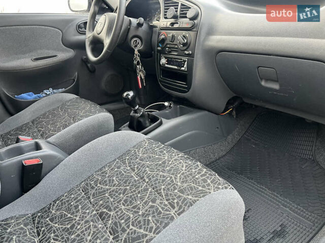 Сірий Деу Ланос, об'ємом двигуна 1.5 л та пробігом 110 тис. км за 1650 $, фото 27 на Automoto.ua