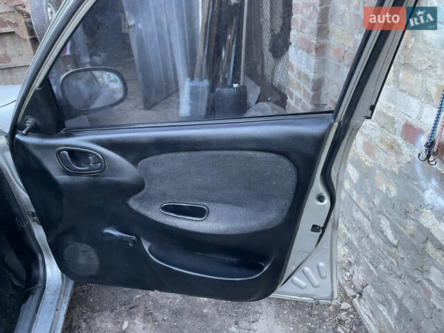 Серый Дэу Ланос, объемом двигателя 1.5 л и пробегом 220 тыс. км за 1200 $, фото 7 на Automoto.ua