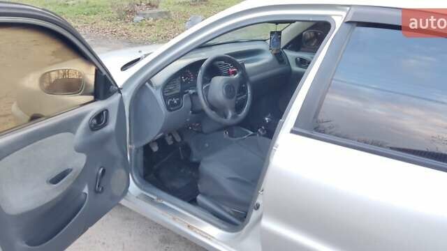 Серый Дэу Ланос, объемом двигателя 1.5 л и пробегом 262 тыс. км за 1750 $, фото 11 на Automoto.ua