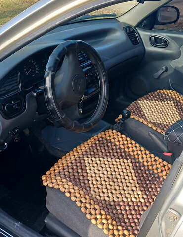 Сірий Деу Ланос, об'ємом двигуна 1.5 л та пробігом 335 тис. км за 2400 $, фото 6 на Automoto.ua