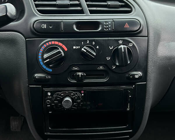 Сірий Деу Ланос, об'ємом двигуна 1.5 л та пробігом 210 тис. км за 2490 $, фото 30 на Automoto.ua