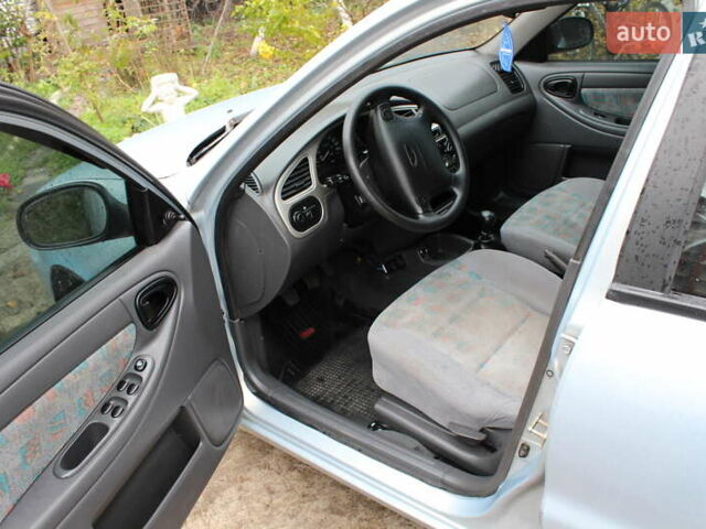 Деу Ланос 2005 у Житомирі на Automoto.ua Сірий Деу Ланос, об'ємом двигуна 1.6 л та пробігом 215 тис. км за 1750 $, фото 6 на Automoto.ua