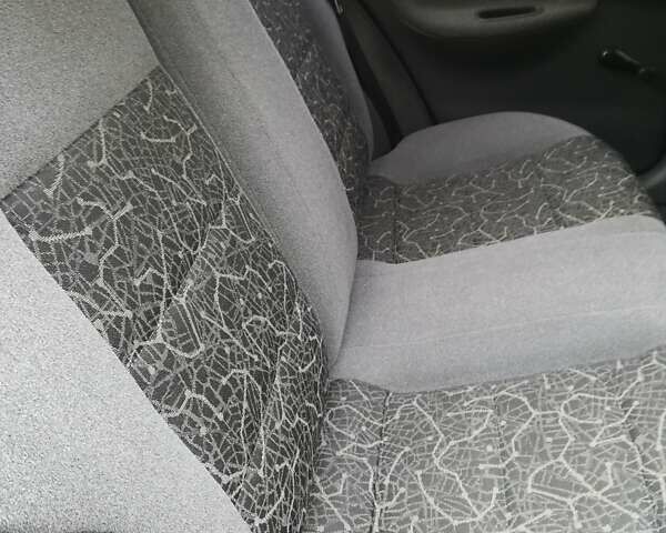 Серый Дэу Ланос, объемом двигателя 1.5 л и пробегом 77 тыс. км за 3400 $, фото 11 на Automoto.ua