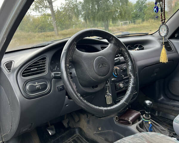 Сірий Деу Ланос, об'ємом двигуна 1.5 л та пробігом 279 тис. км за 1500 $, фото 8 на Automoto.ua