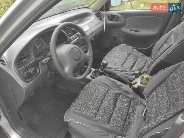 Сірий Деу Ланос, об'ємом двигуна 1.5 л та пробігом 169 тис. км за 1500 $, фото 6 на Automoto.ua