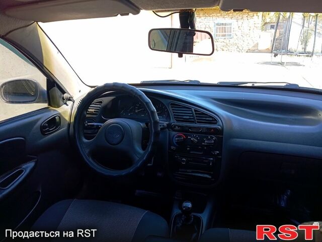 Серый Дэу Ланос, объемом двигателя 1.5 л и пробегом 220 тыс. км за 2700 $, фото 2 на Automoto.ua