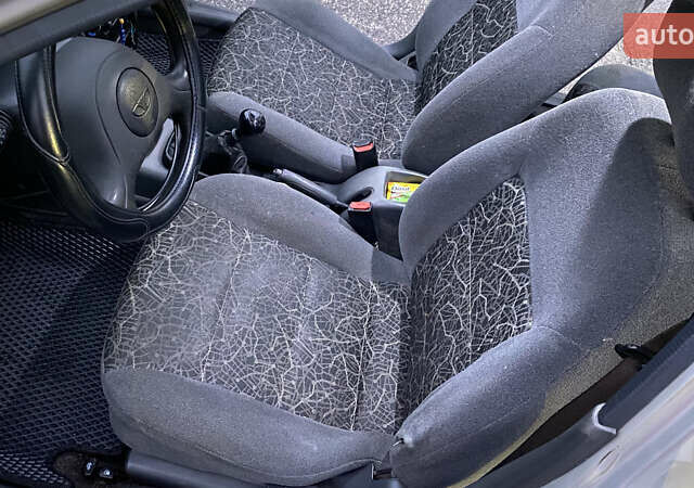 Серый Дэу Ланос, объемом двигателя 1.5 л и пробегом 306 тыс. км за 1600 $, фото 18 на Automoto.ua