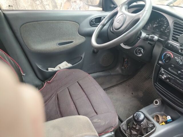 Сірий Деу Ланос, об'ємом двигуна 1.5 л та пробігом 237 тис. км за 1100 $, фото 7 на Automoto.ua