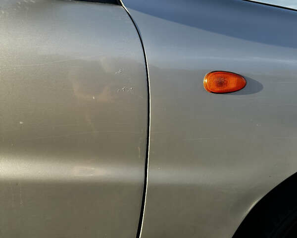 Серый Дэу Ланос, объемом двигателя 1.5 л и пробегом 192 тыс. км за 2600 $, фото 4 на Automoto.ua