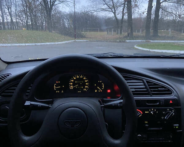 Сірий Деу Ланос, об'ємом двигуна 1.5 л та пробігом 230 тис. км за 1550 $, фото 5 на Automoto.ua