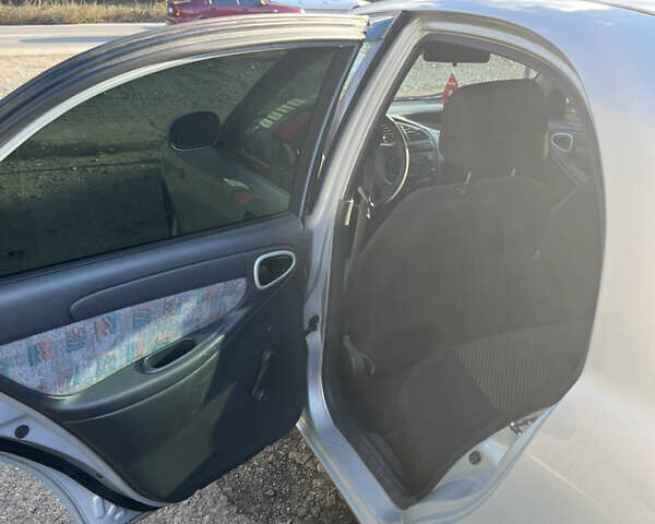 Сірий Деу Ланос, об'ємом двигуна 1.5 л та пробігом 202 тис. км за 2650 $, фото 12 на Automoto.ua