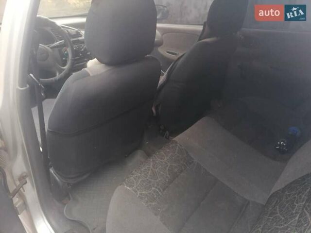 Серый Дэу Ланос, объемом двигателя 1.5 л и пробегом 317 тыс. км за 1950 $, фото 8 на Automoto.ua