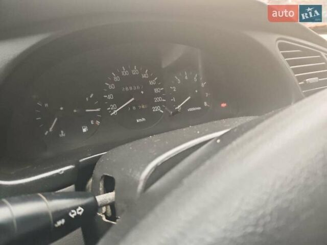 Сірий Деу Ланос, об'ємом двигуна 1.5 л та пробігом 268 тис. км за 1900 $, фото 1 на Automoto.ua