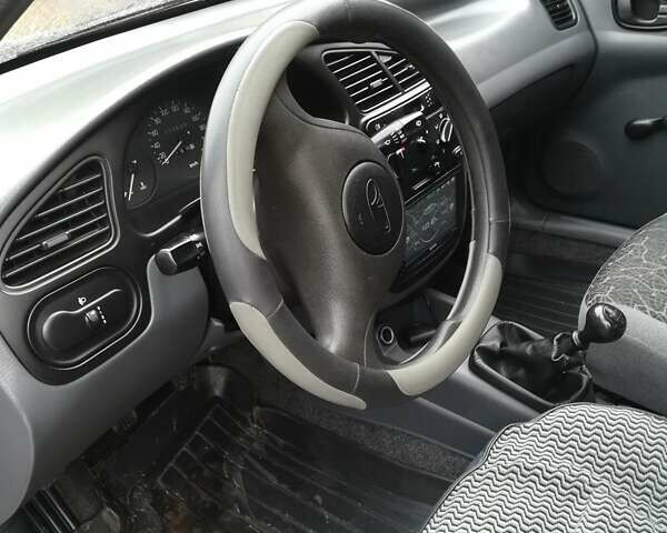 Сірий Деу Ланос, об'ємом двигуна 1.5 л та пробігом 77 тис. км за 3200 $, фото 22 на Automoto.ua