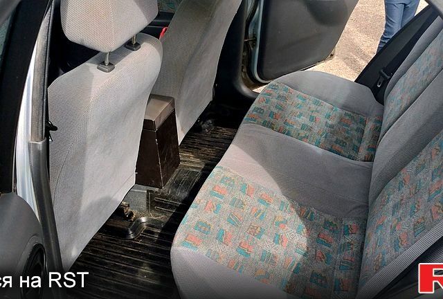 Серый Дэу Ланос, объемом двигателя 1.6 л и пробегом 213 тыс. км за 1500 $, фото 2 на Automoto.ua