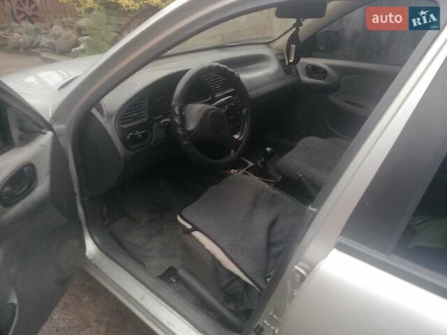 Серый Дэу Ланос, объемом двигателя 1.5 л и пробегом 317 тыс. км за 1950 $, фото 6 на Automoto.ua