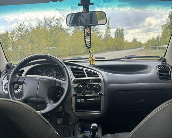 Сірий Деу Ланос, об'ємом двигуна 1.5 л та пробігом 200 тис. км за 3200 $, фото 8 на Automoto.ua