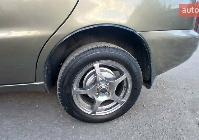 Сірий Деу Ланос, об'ємом двигуна 1.5 л та пробігом 190 тис. км за 3100 $, фото 6 на Automoto.ua