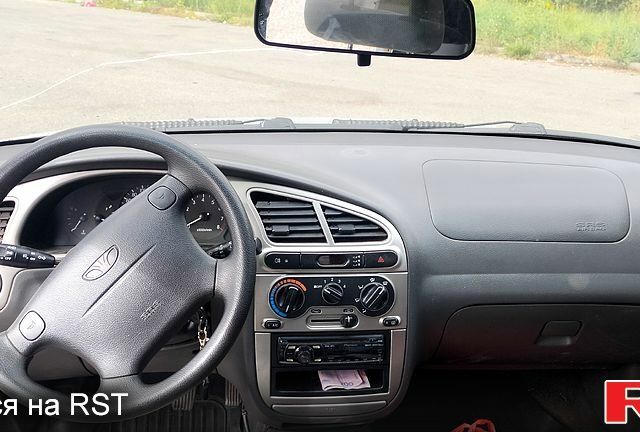 Серый Дэу Ланос, объемом двигателя 1.6 л и пробегом 213 тыс. км за 1500 $, фото 5 на Automoto.ua