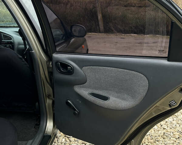 Сірий Деу Ланос, об'ємом двигуна 1.5 л та пробігом 210 тис. км за 2490 $, фото 21 на Automoto.ua