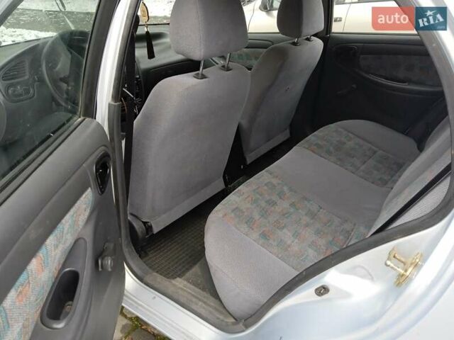 Серый Дэу Ланос, объемом двигателя 1.5 л и пробегом 170 тыс. км за 3000 $, фото 4 на Automoto.ua