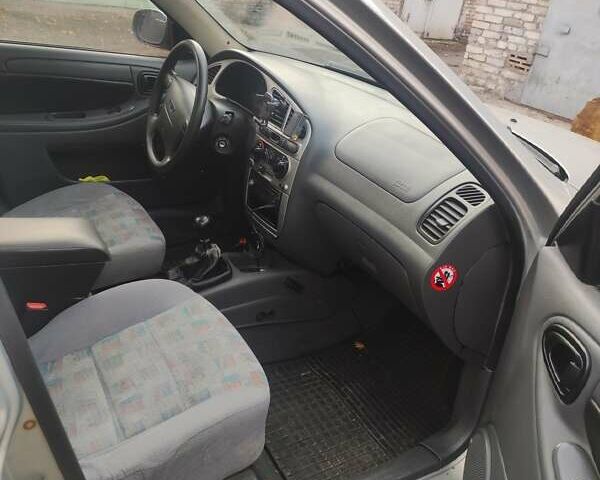 Серый Дэу Ланос, объемом двигателя 1.6 л и пробегом 238 тыс. км за 2599 $, фото 2 на Automoto.ua