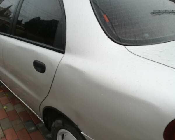 Серый Дэу Ланос, объемом двигателя 1.5 л и пробегом 77 тыс. км за 3400 $, фото 25 на Automoto.ua