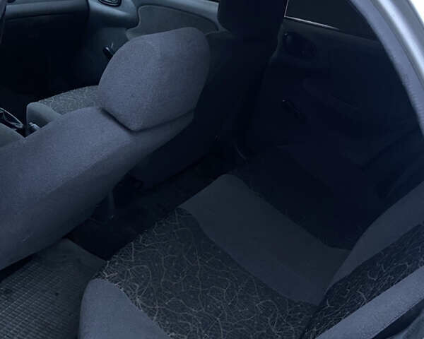 Сірий Деу Ланос, об'ємом двигуна 1.5 л та пробігом 230 тис. км за 1550 $, фото 4 на Automoto.ua