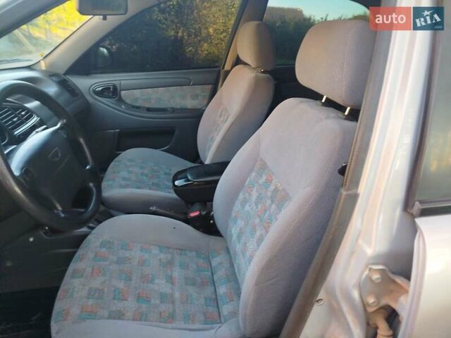 Серый Дэу Ланос, объемом двигателя 1.5 л и пробегом 216 тыс. км за 2250 $, фото 1 на Automoto.ua