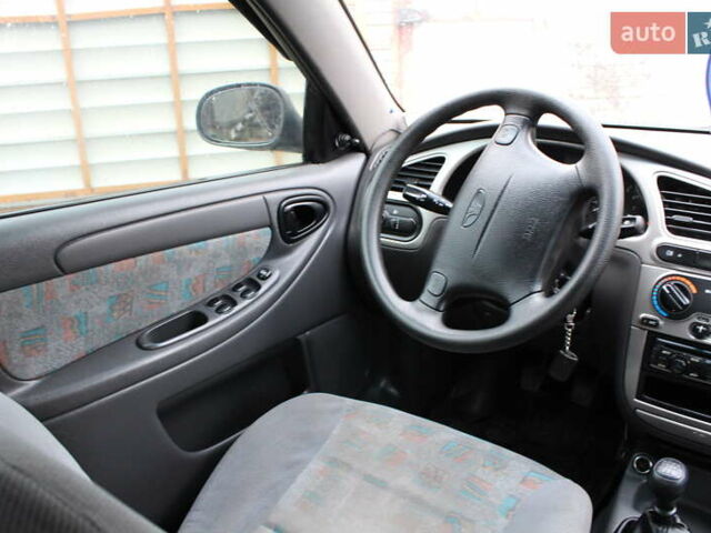 Деу Ланос 2005 у Житомирі на Automoto.ua Сірий Деу Ланос, об'ємом двигуна 1.6 л та пробігом 215 тис. км за 1750 $, фото 8 на Automoto.ua