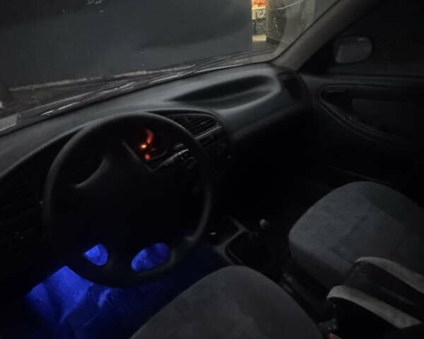 Сірий Деу Ланос, об'ємом двигуна 1.5 л та пробігом 190 тис. км за 1350 $, фото 8 на Automoto.ua