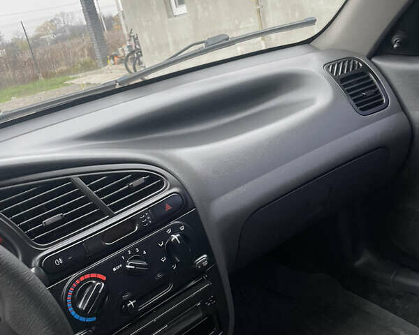 Серый Дэу Ланос, объемом двигателя 1.5 л и пробегом 205 тыс. км за 2300 $, фото 12 на Automoto.ua