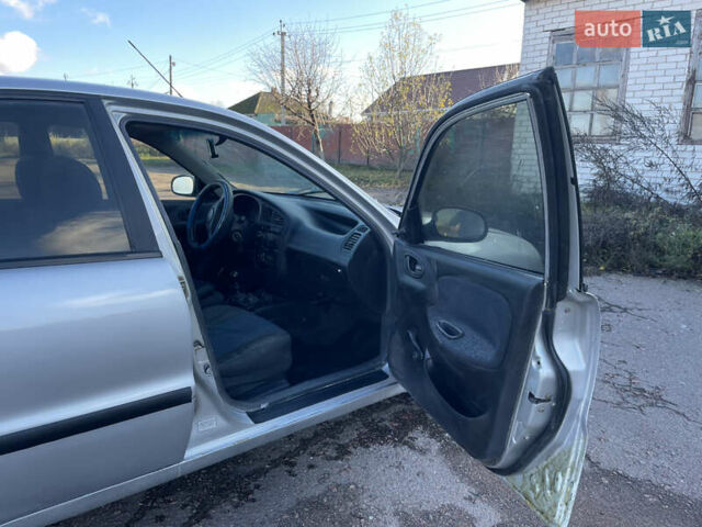 Серый Дэу Ланос, объемом двигателя 1.5 л и пробегом 250 тыс. км за 1450 $, фото 24 на Automoto.ua