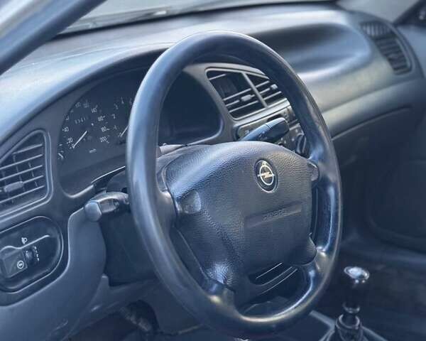 Сірий Деу Ланос, об'ємом двигуна 1.5 л та пробігом 150 тис. км за 1950 $, фото 5 на Automoto.ua