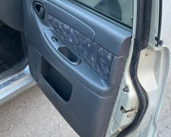 Сірий Деу Ланос, об'ємом двигуна 1.5 л та пробігом 150 тис. км за 1950 $, фото 1 на Automoto.ua