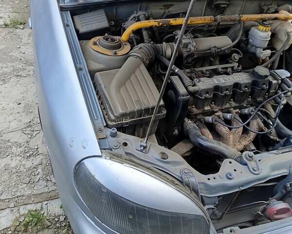 Сірий Деу Ланос, об'ємом двигуна 1.5 л та пробігом 220 тис. км за 750 $, фото 3 на Automoto.ua