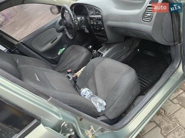 Серый Дэу Ланос, объемом двигателя 1.5 л и пробегом 198 тыс. км за 1550 $, фото 6 на Automoto.ua