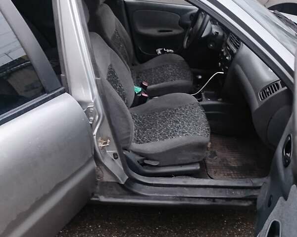 Серый Дэу Ланос, объемом двигателя 1.5 л и пробегом 201 тыс. км за 3500 $, фото 7 на Automoto.ua