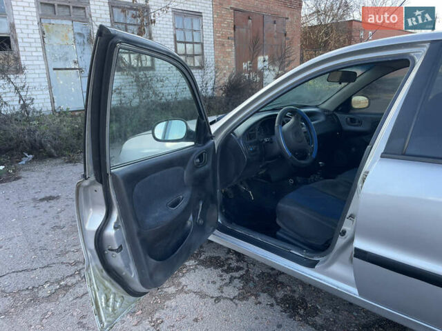 Серый Дэу Ланос, объемом двигателя 1.5 л и пробегом 250 тыс. км за 1450 $, фото 20 на Automoto.ua