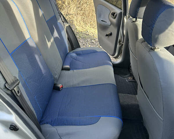 Серый Дэу Ланос, объемом двигателя 1.5 л и пробегом 225 тыс. км за 2000 $, фото 8 на Automoto.ua