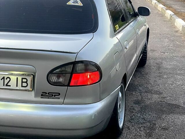 Серый Дэу Ланос, объемом двигателя 2 л и пробегом 260 тыс. км за 3000 $, фото 1 на Automoto.ua