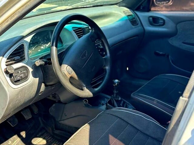 Сірий Деу Ланос, об'ємом двигуна 1.6 л та пробігом 240 тис. км за 1300 $, фото 3 на Automoto.ua