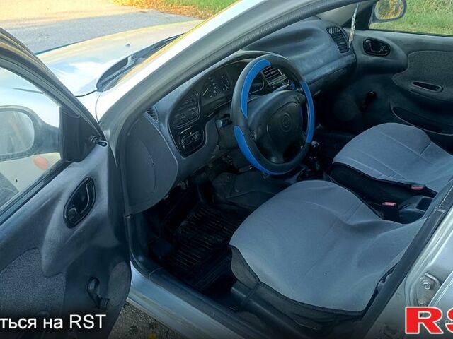 Серый Дэу Ланос, объемом двигателя 1.5 л и пробегом 333 тыс. км за 1400 $, фото 6 на Automoto.ua